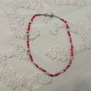 Very pretty flower clay bead necklace.